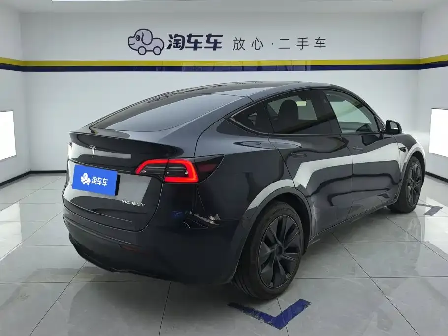 Tesla Model Y — фото 8