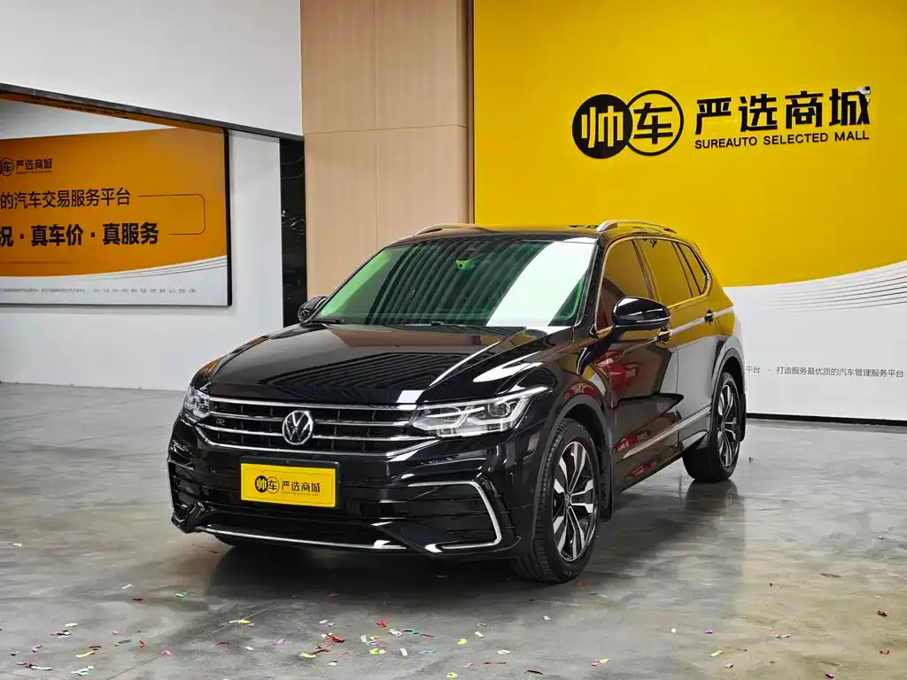 Volkswagen Tiguan L — фото 1