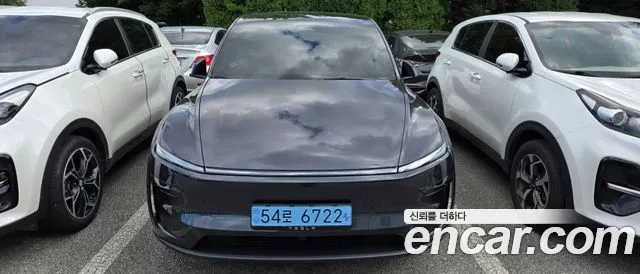 Tesla Model Y — фото 1