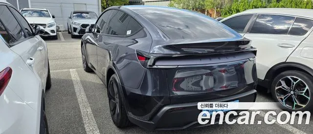 Tesla Model Y — фото 9