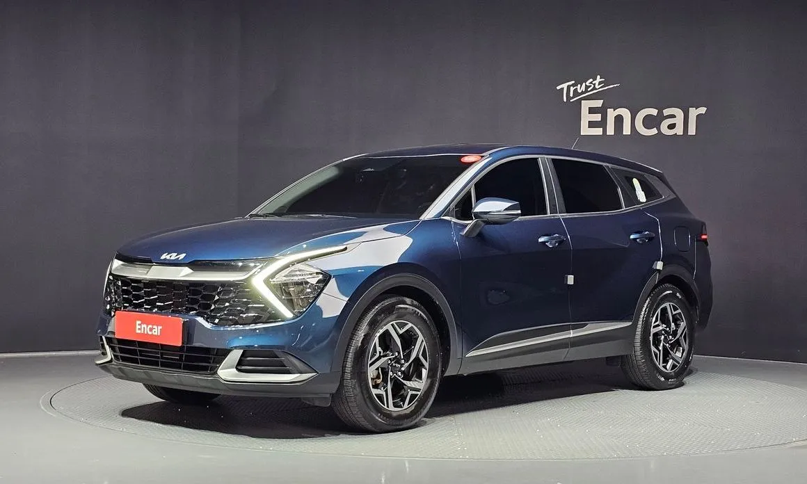 Kia Sportage — фото 1