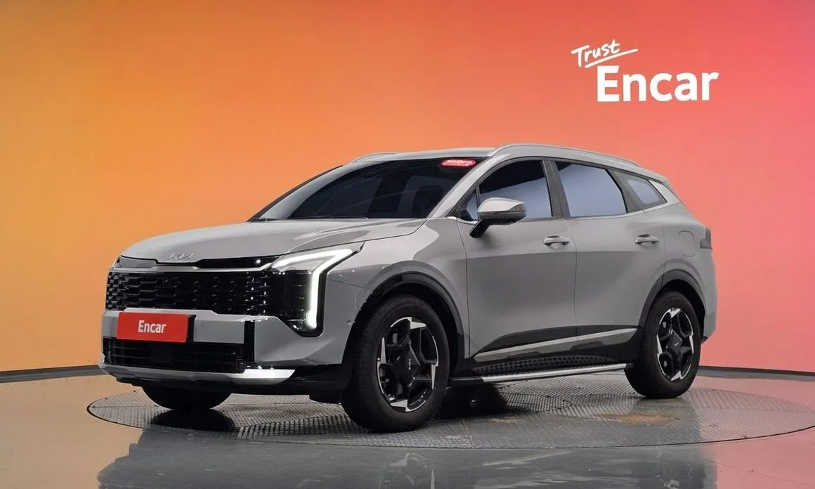 Kia Sportage — фото 1