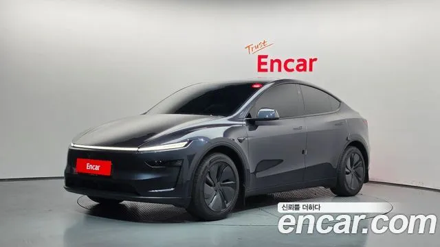 Tesla Model Y — фото 1