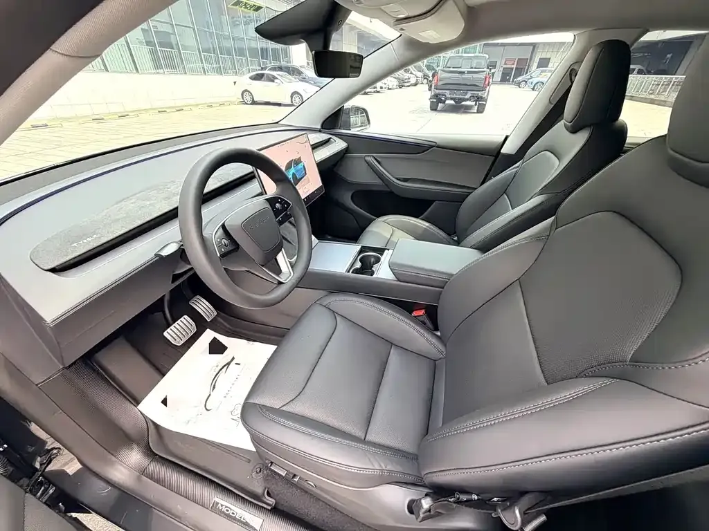 Tesla Model Y — фото 5