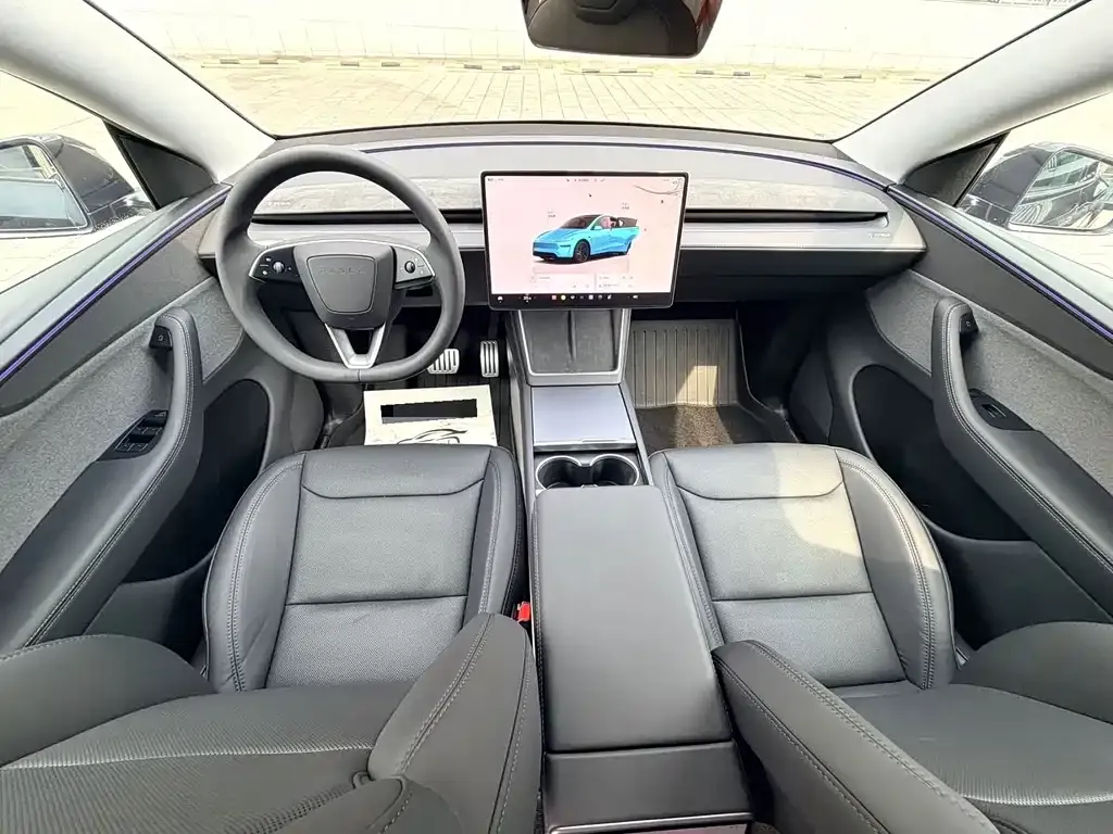 Tesla Model Y — фото 9