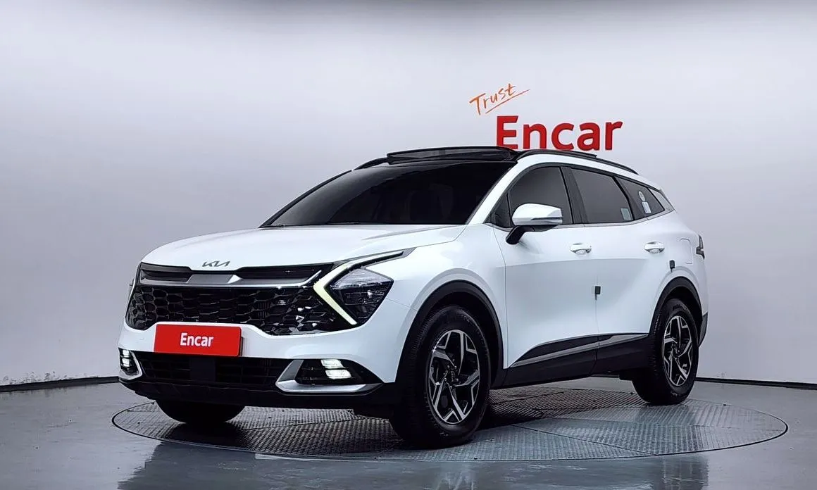 Kia Sportage — фото 1