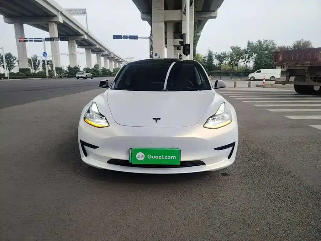 Tesla Model 3 — фото 8