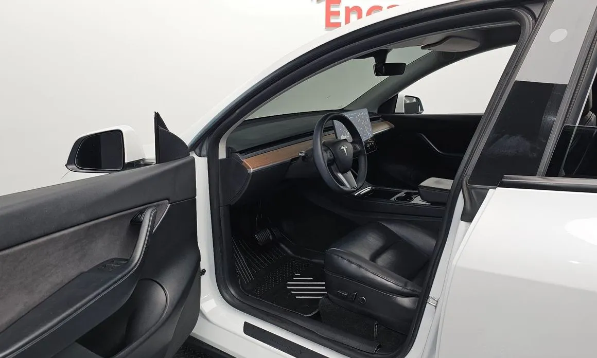 Tesla Model Y — фото 6