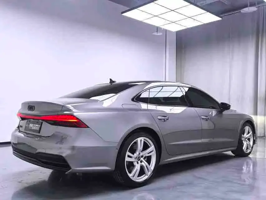 Audi A7L — фото 8