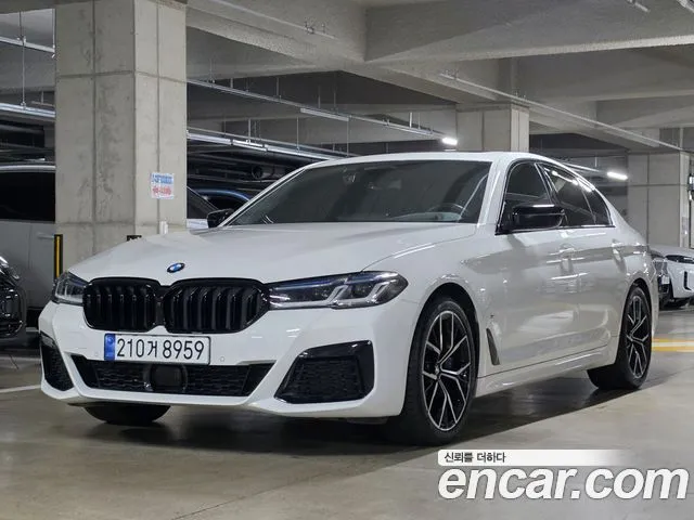 BMW 5-Series — фото 1