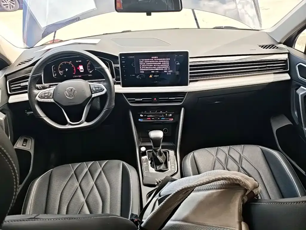 Volkswagen Tiguan L — фото 3
