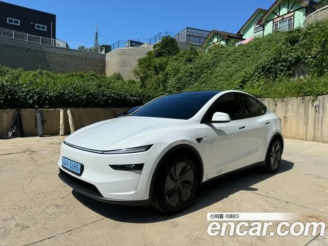 Tesla Model Y — фото 10