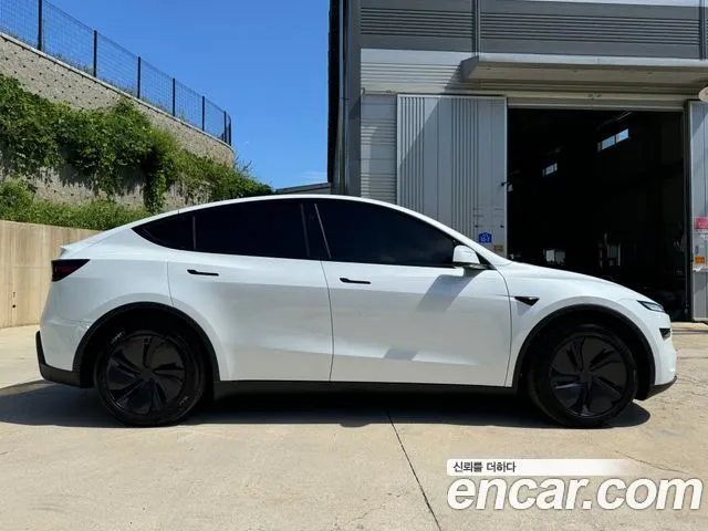 Tesla Model Y — фото 6