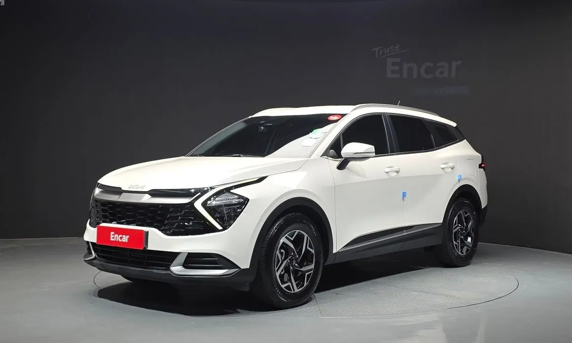 Kia Sportage — фото 1