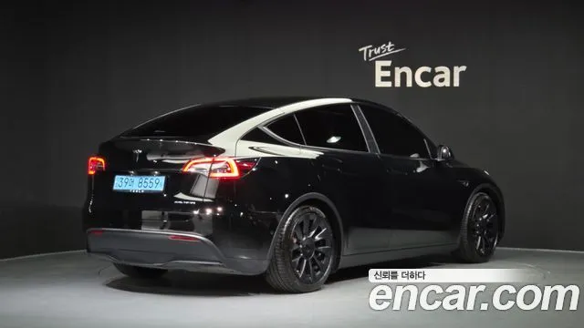 Tesla Model Y — фото 9