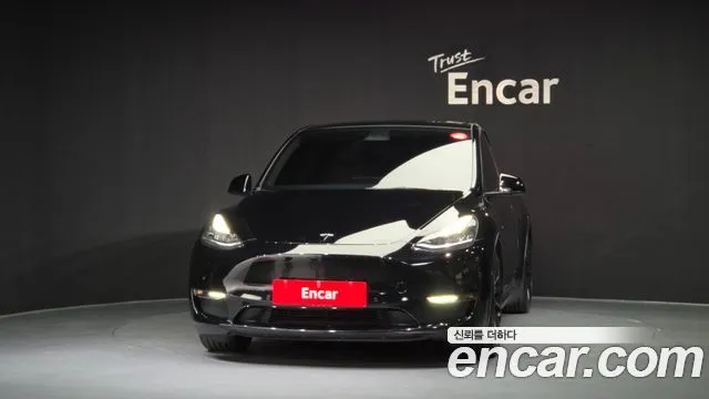 Tesla Model Y — фото 10