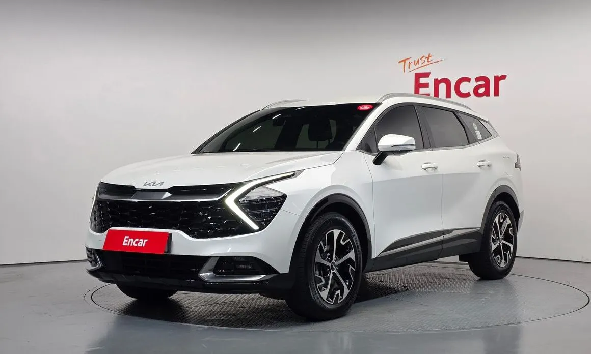 Kia Sportage — фото 1