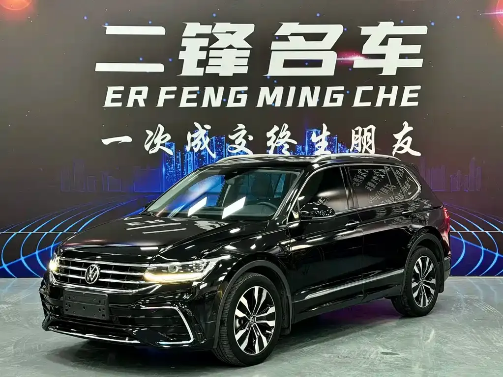 Volkswagen Tiguan L — фото 1