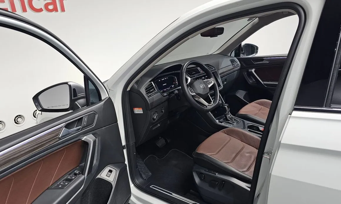 Volkswagen Tiguan — фото 7