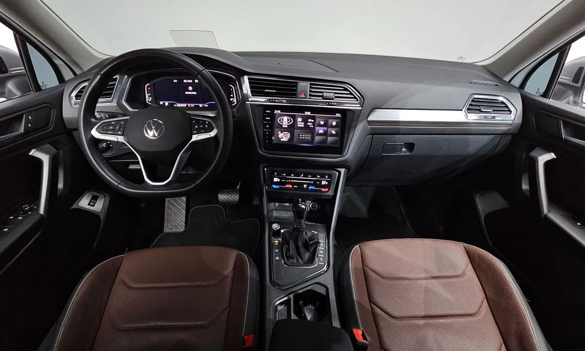 Volkswagen Tiguan — фото 9