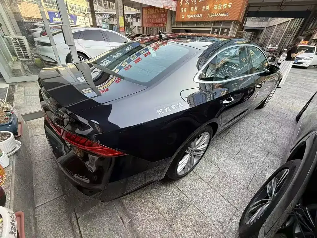 Audi A7L — фото 5
