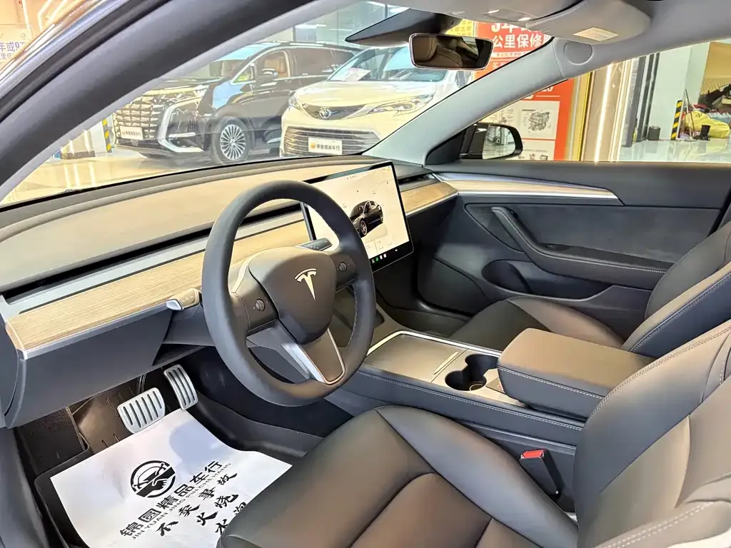 Tesla Model 3 — фото 6