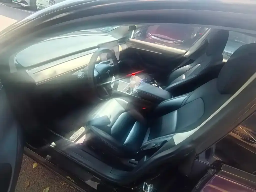 Tesla Model 3 — фото 10