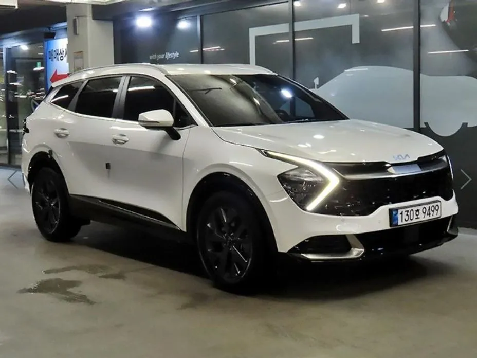 Kia Sportage — фото 1