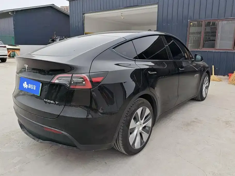 Tesla Model Y — фото 7