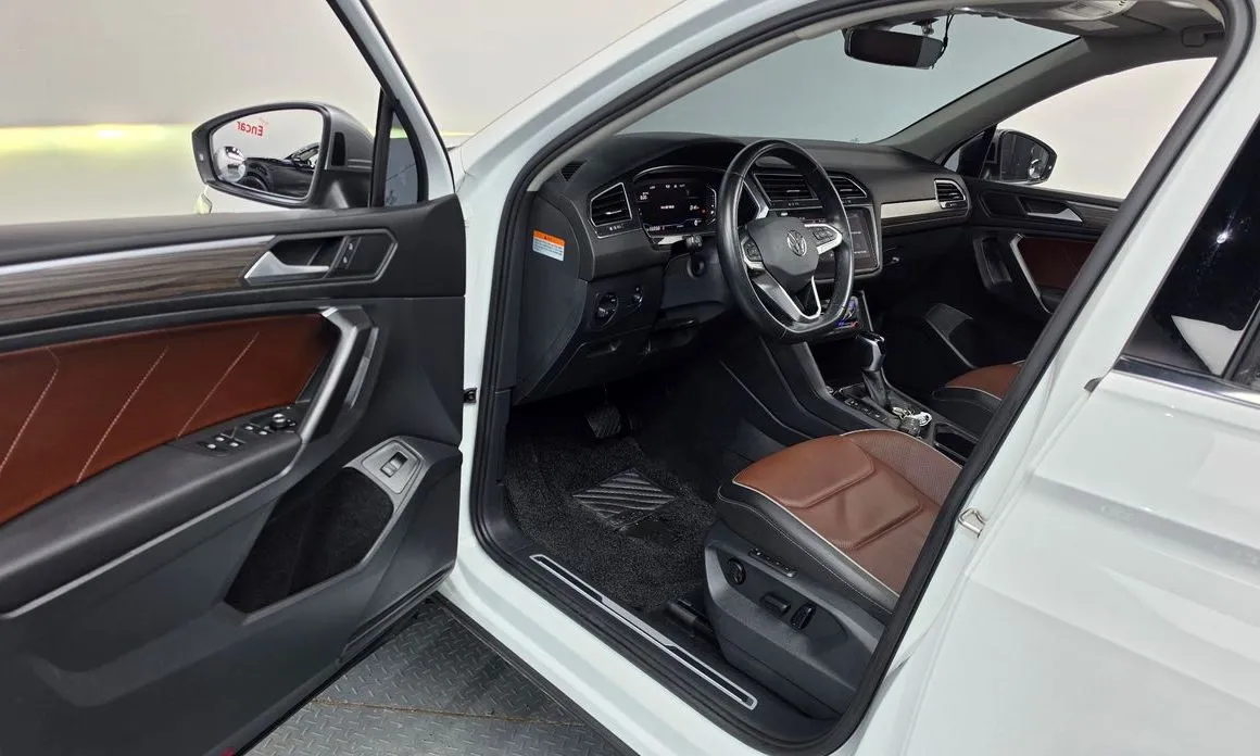 Volkswagen Tiguan — фото 10