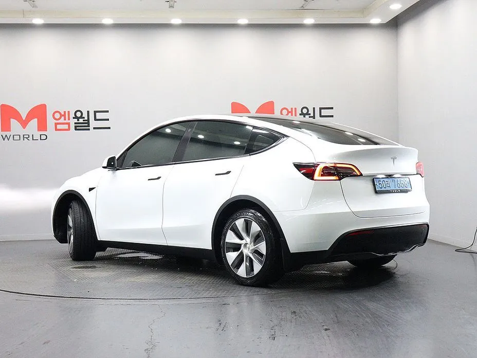 Tesla Model Y — фото 7