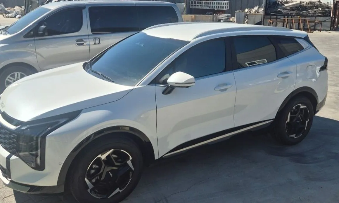 Kia Sportage — фото 1