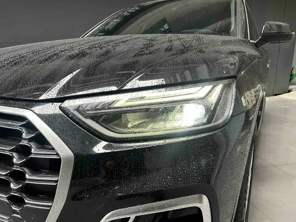 Audi Q5L — фото 10