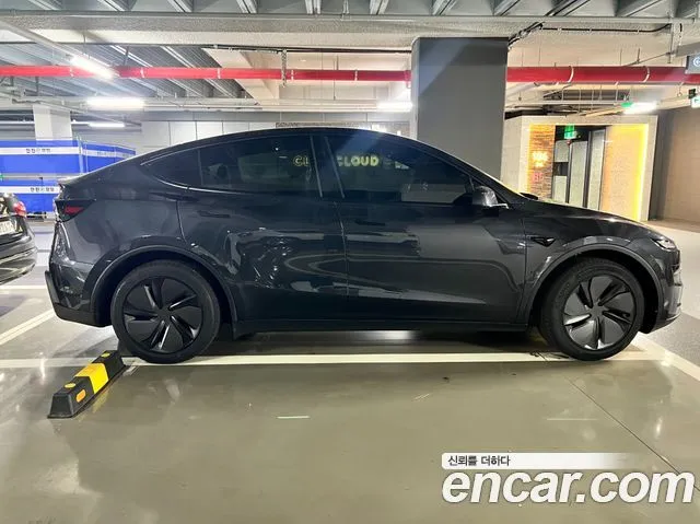 Tesla Model Y — фото 7