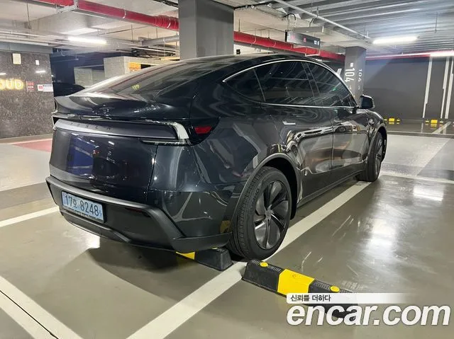 Tesla Model Y — фото 5