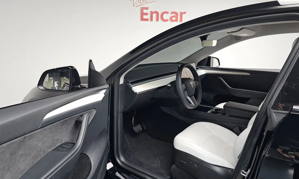 Tesla Model Y — фото 7