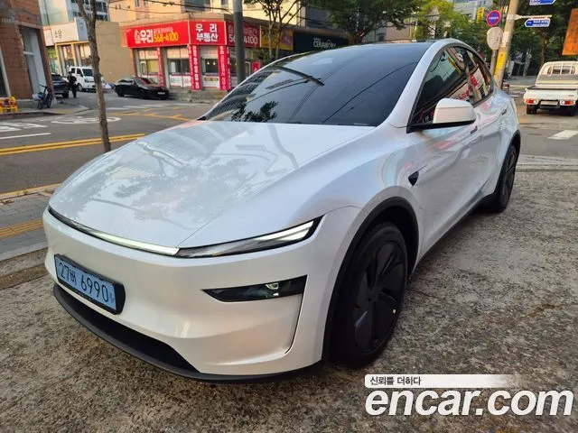 Tesla Model Y — фото 6