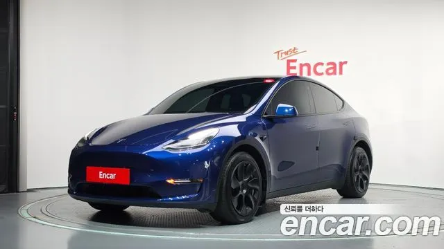 Tesla Model Y — фото 1