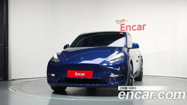 Tesla Model Y — фото 10