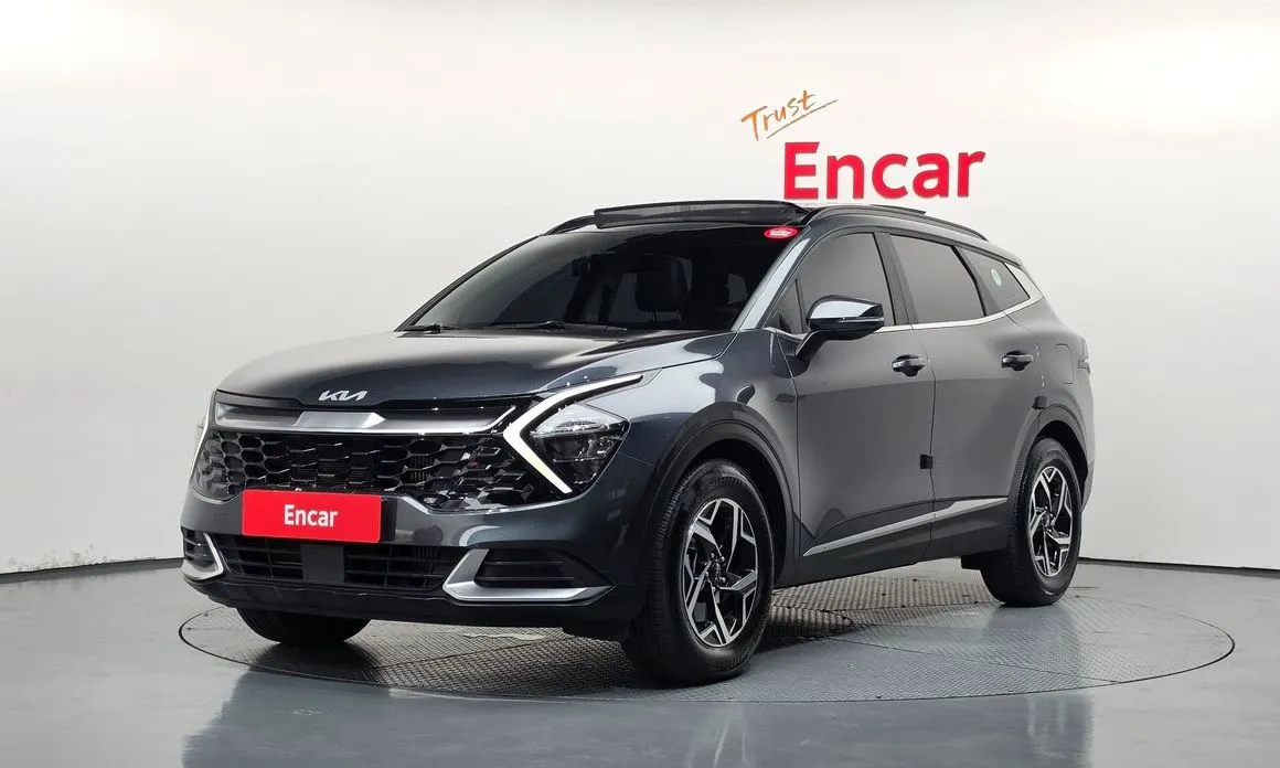 Kia Sportage — фото 1