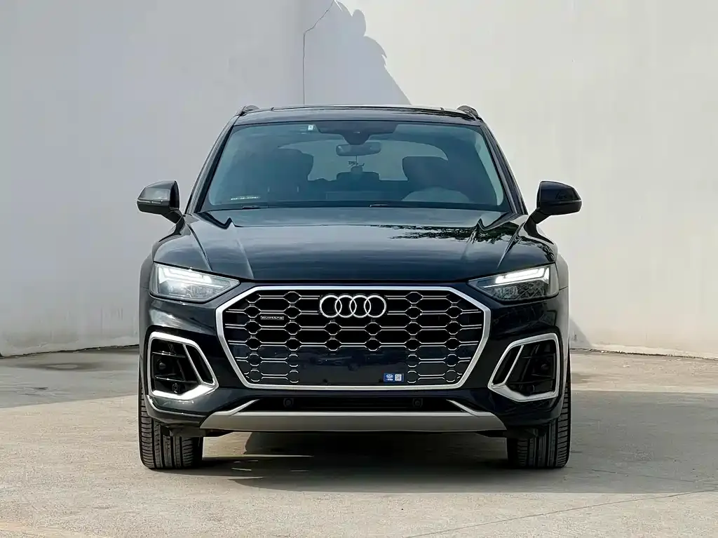 Audi Q5L — фото 9
