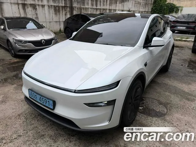 Tesla Model Y — фото 10