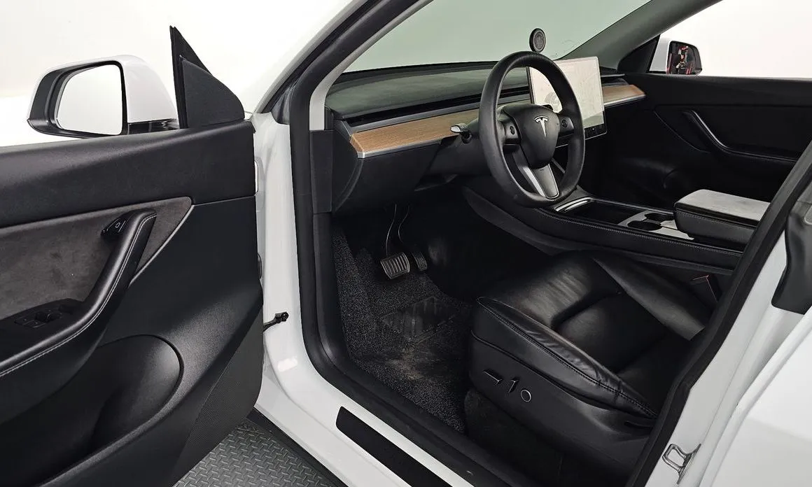 Tesla Model Y — фото 6