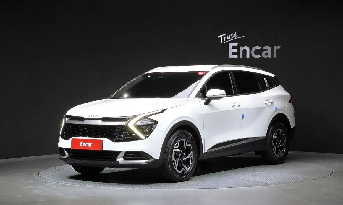 Kia Sportage — фото 1