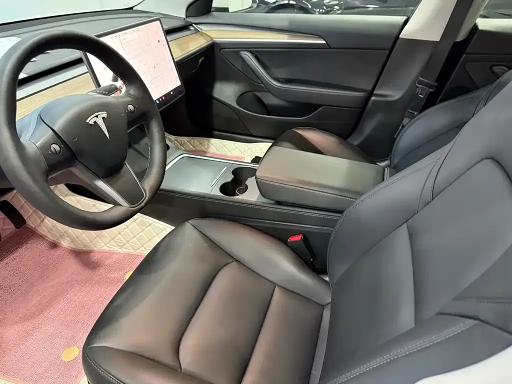 Tesla Model 3 — фото 9