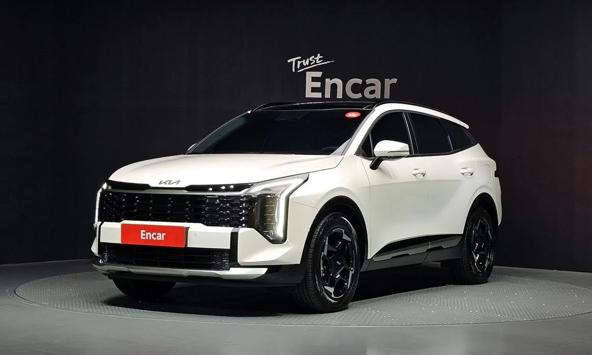 Kia Sportage — фото 1