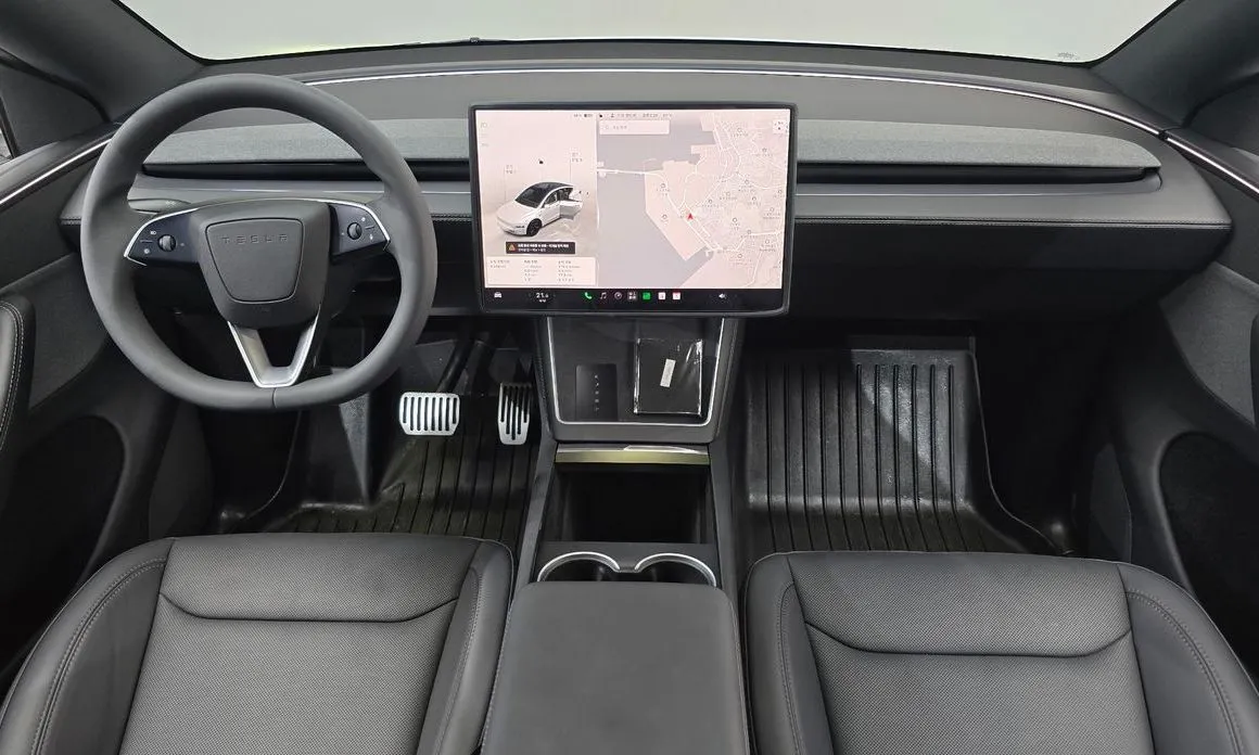 Tesla Model Y — фото 10