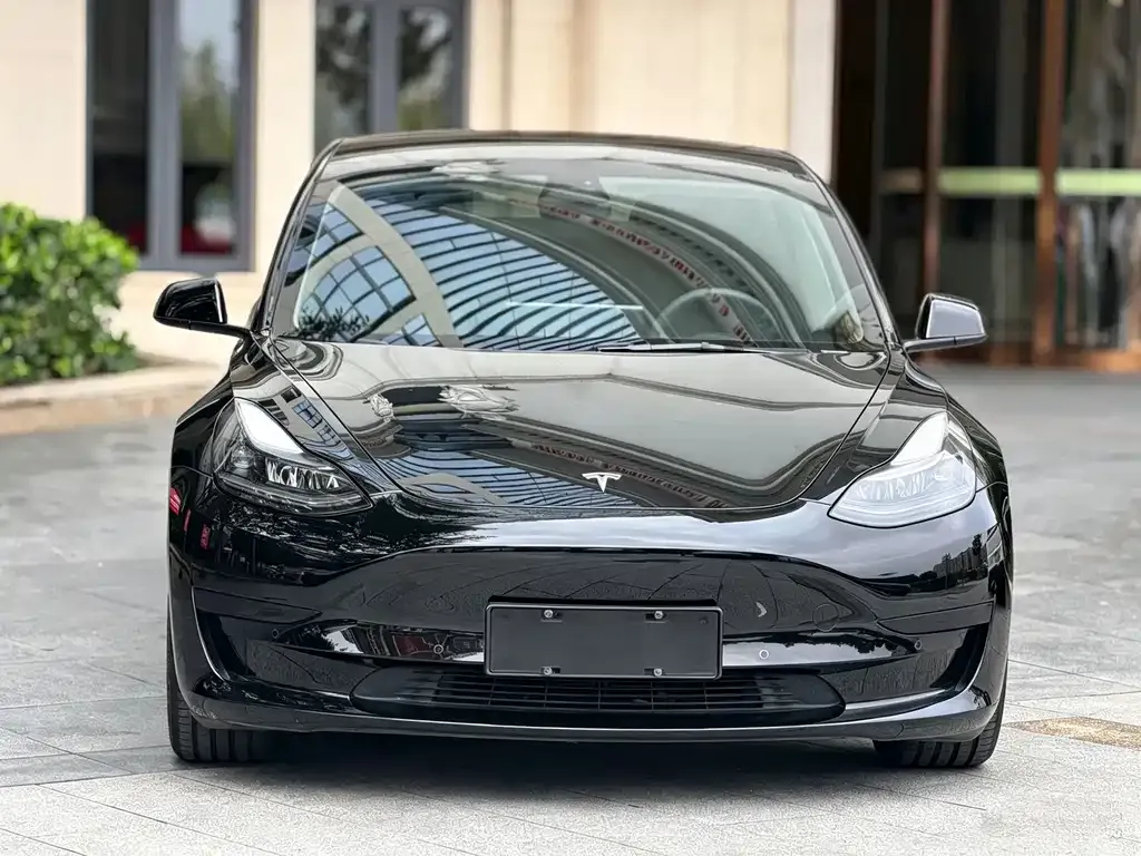 Tesla Model 3 — фото 7