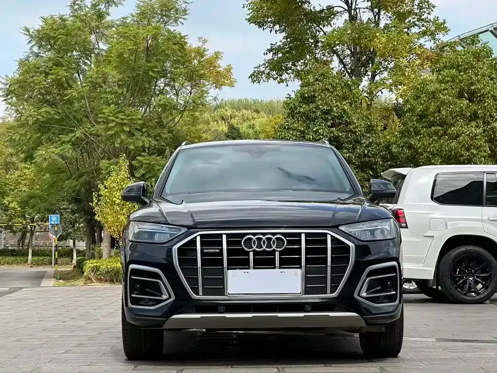 Audi Q5L — фото 10
