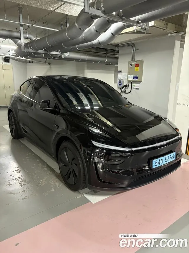 Tesla Model Y — фото 1